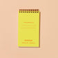 interior flap of shrimp pocket notebook. Has a yellow background with red text that reads "If found, please return to:" along with brand name at bottom 