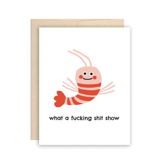 Greeting card with an illustrated shrimp on it and text below it that reads "what a fucking shit show"