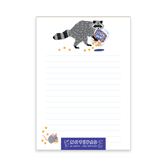 Notepad with a raccoon and snak cheese ballz illustration and colorful design on a white background