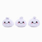 Three white plush soup dumpling dog toys with smiling faces on a white background