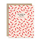 Greeting card with red chili pepper pattern and text "you spice up my life. Happy Valentine's!" on a beige background