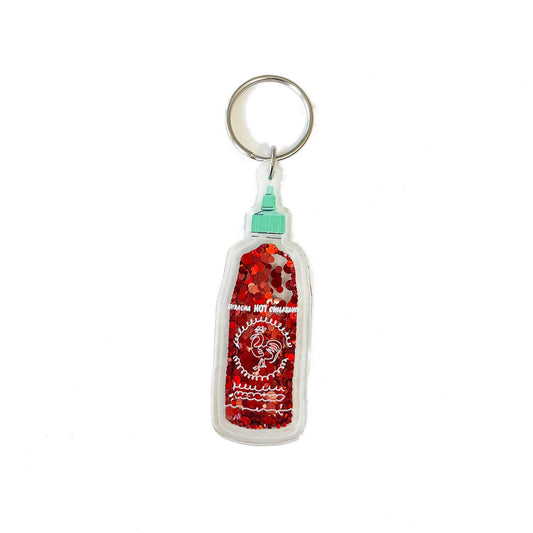 sriracha keychain with red glitter inside that moves