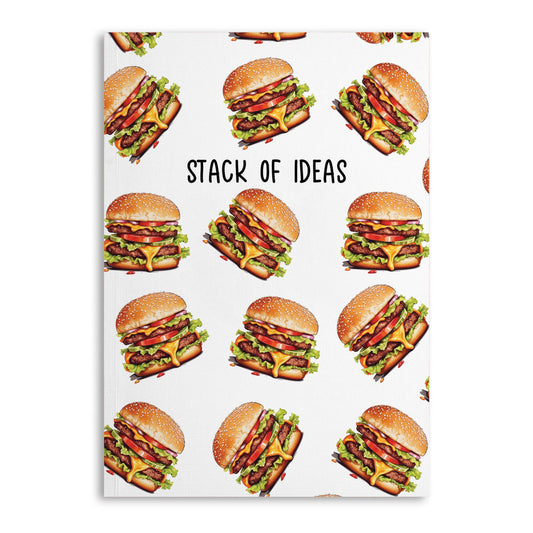 White notebook with cheeseburgers all over and in the upper center the text reads "Stack of Ideas" 