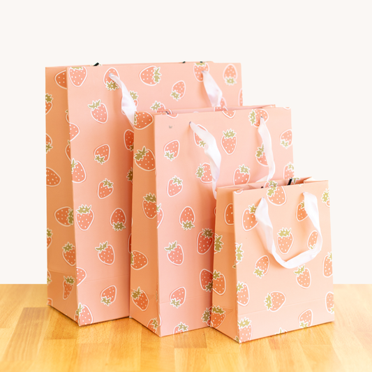 three sizes of strawberry gift bags by elyse breanne design 