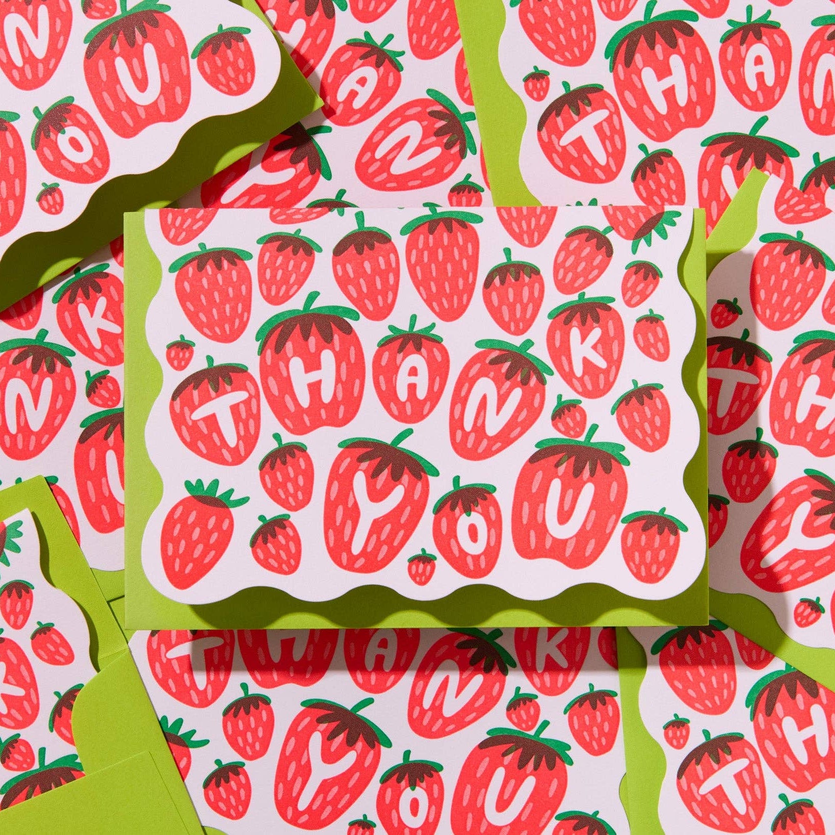 Card with strawberry pattern and 'THANK YOU' text on a white background