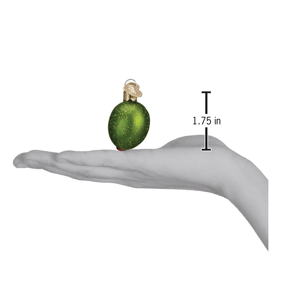 Green stuffed olive ornament on a hand with measurement label