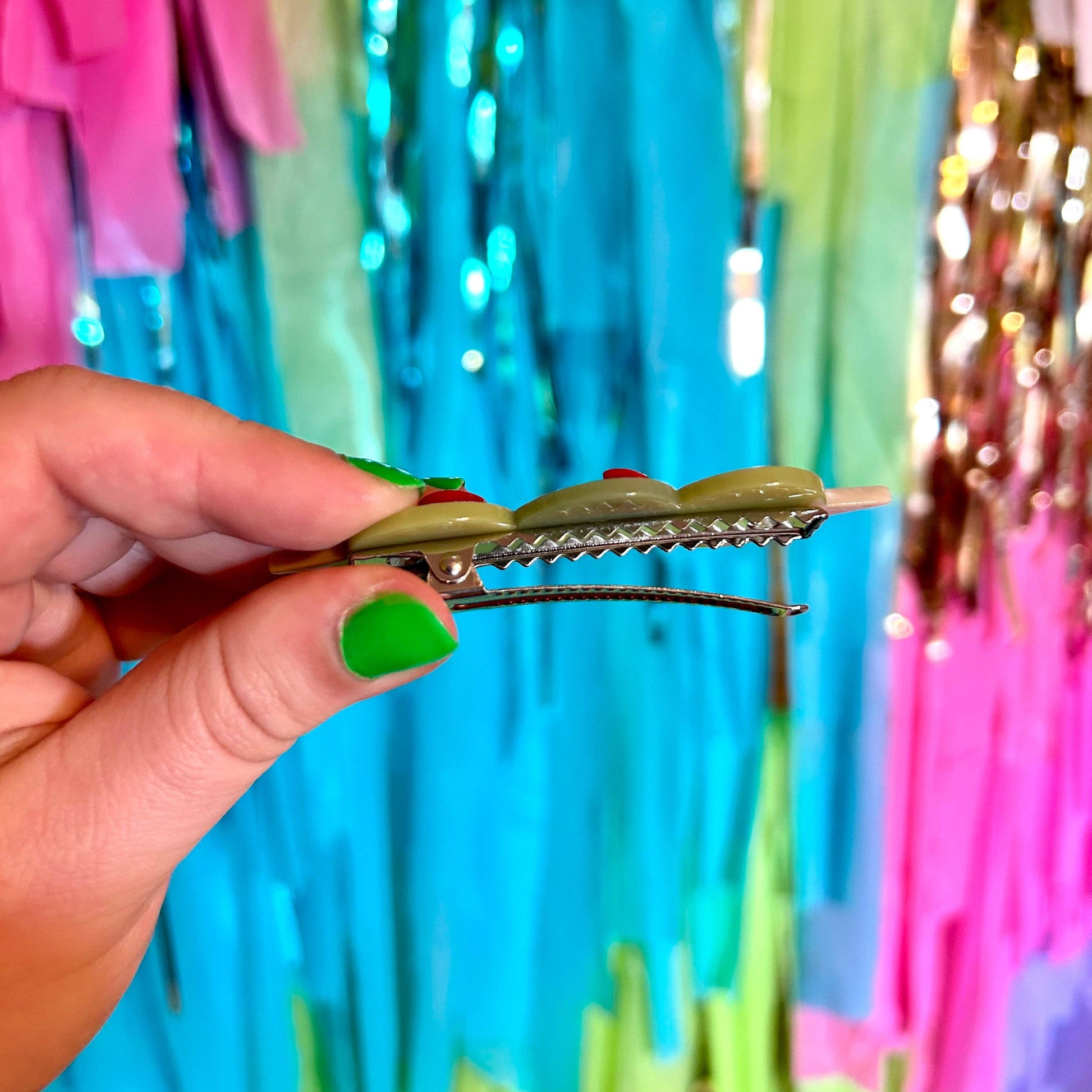 alligator clip of the stuffed olive hair clip 