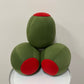 Three green olive pillows stacked on top of each other.