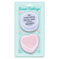 Packaged sticky notes with heart and round shaped cakes on a light blue background