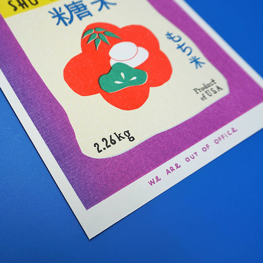 Close-up of a sweet rice bag label with a red flower design on a blue background