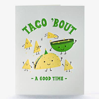 Greeting card with green text that reads "Taco 'bout a good time" with tortilla chips jumping into a bowl of queso and a hard shell taco wearing a birthday party hat