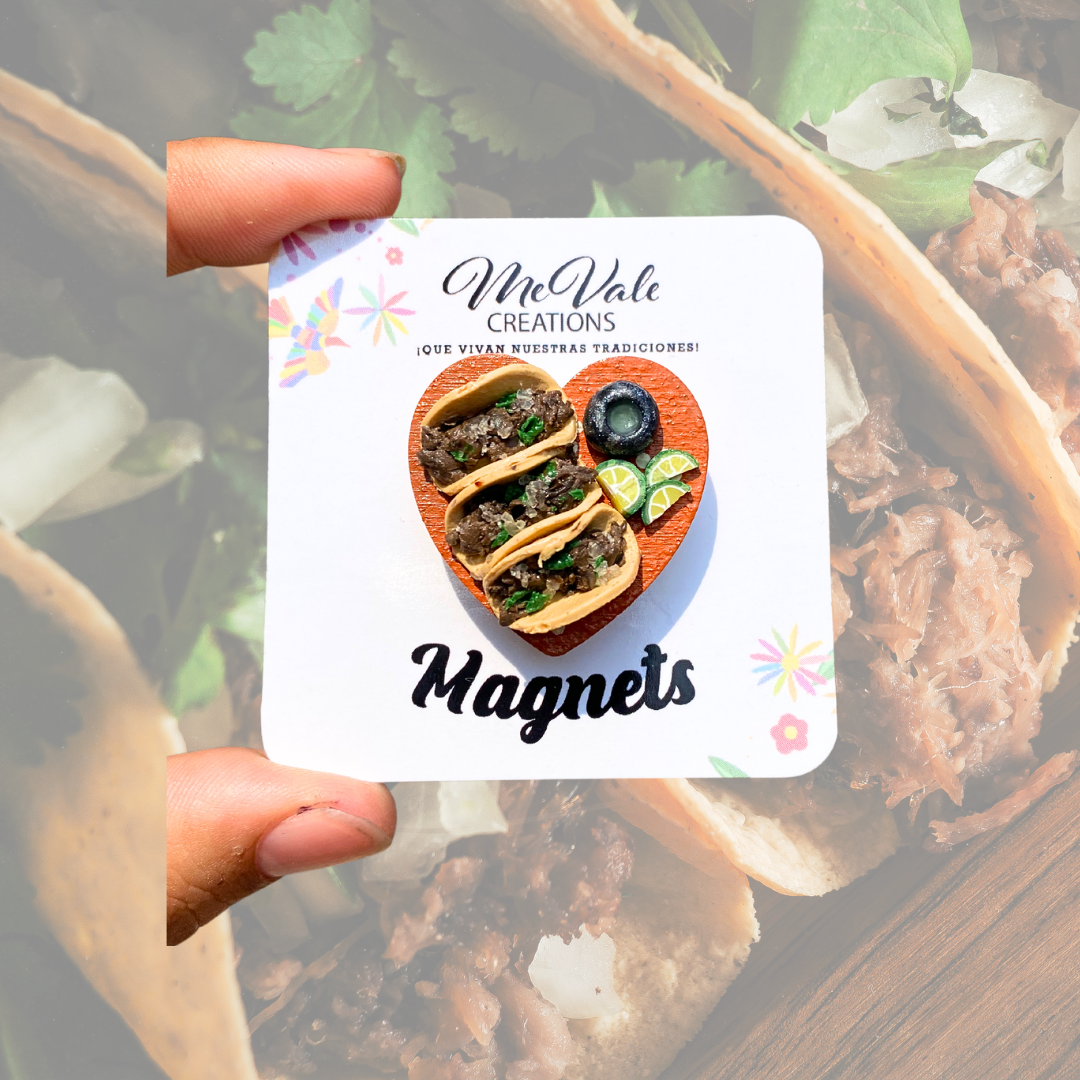 heart shaped magnet with 3 tacos on top with lime wedges 