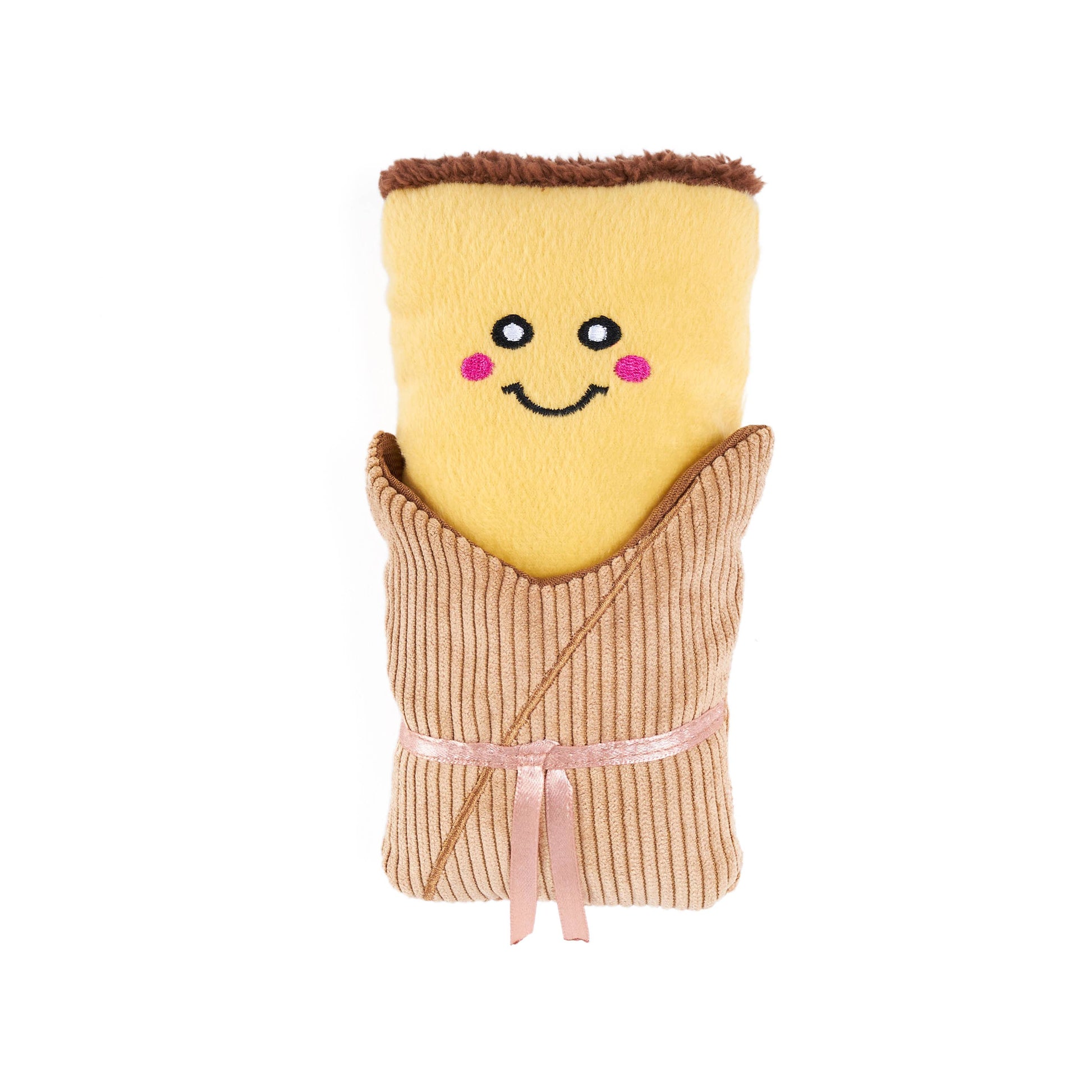 Toy resembling a tamale with a face on a white background