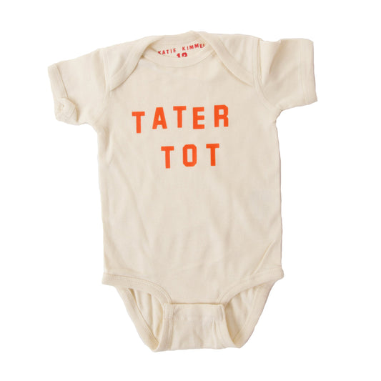 baby onesie that has "tater tot" printed in orange on it 