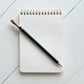 Interior lined pages of the small, spiral, notebook with a hand painted tinned fish design 