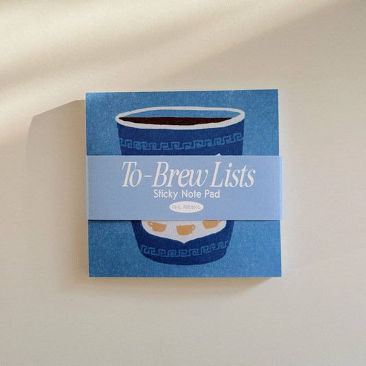 Stack of sticky notes called "to-brew lists" designed with a cup of coffee on it