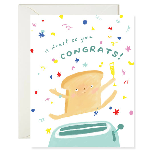 Greeting card with a toast character popping out of a toaster and 'a toast to you, Congrats!' text on a white background