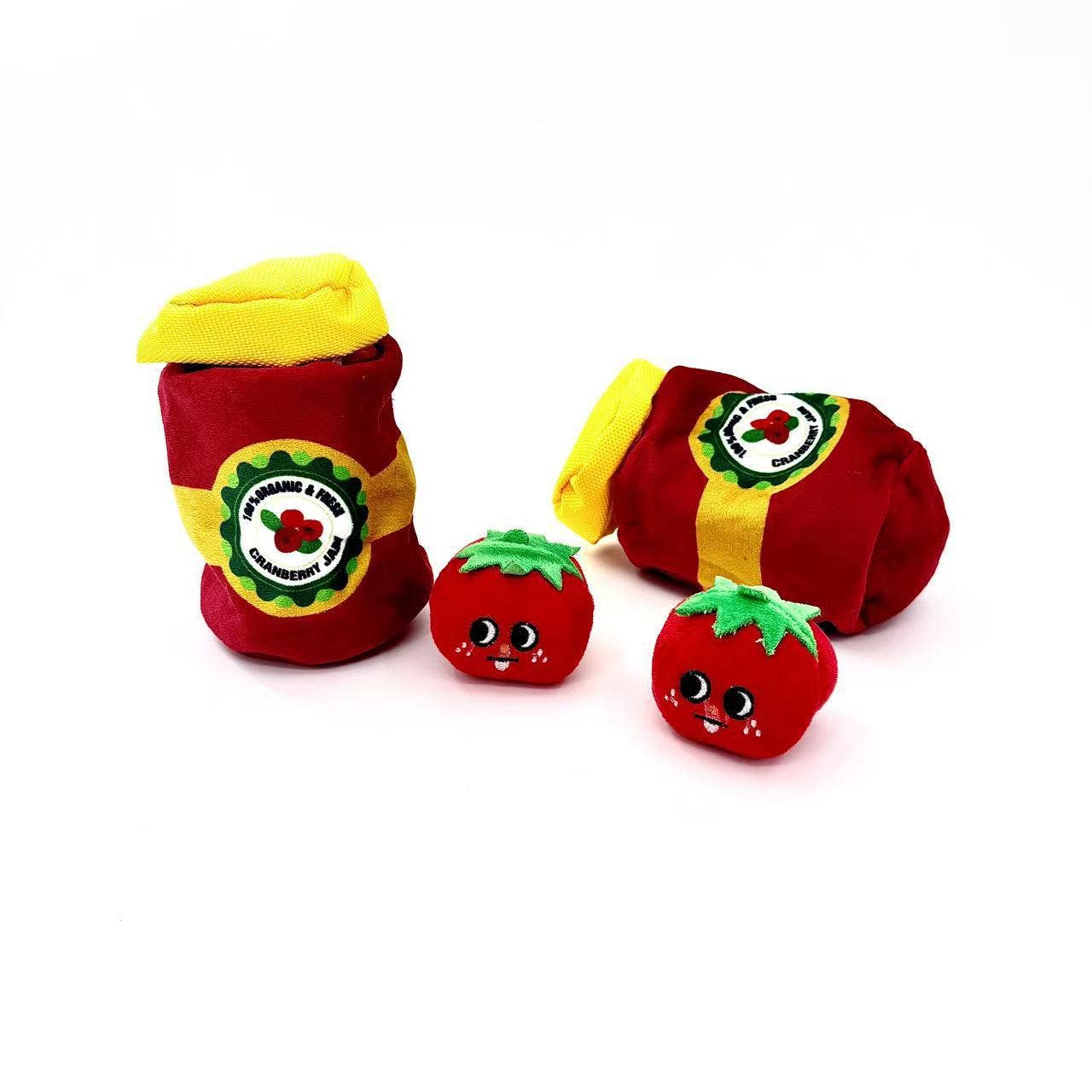 soft, plush dog toy that looks like a can of tomatoes and has 2 individual tomatoes that come out of can 