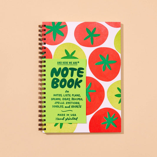 Notebook with tomato pattern on a beige background