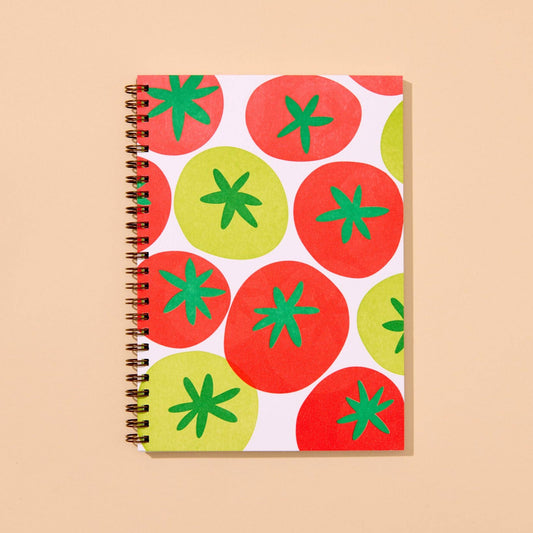 Notebook with tomato pattern on a beige background