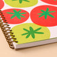 Notebook with tomato pattern on a beige background