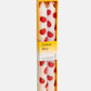 Pack of taper candles with red tomato design in a 'Dolce Vita' box on a white background
