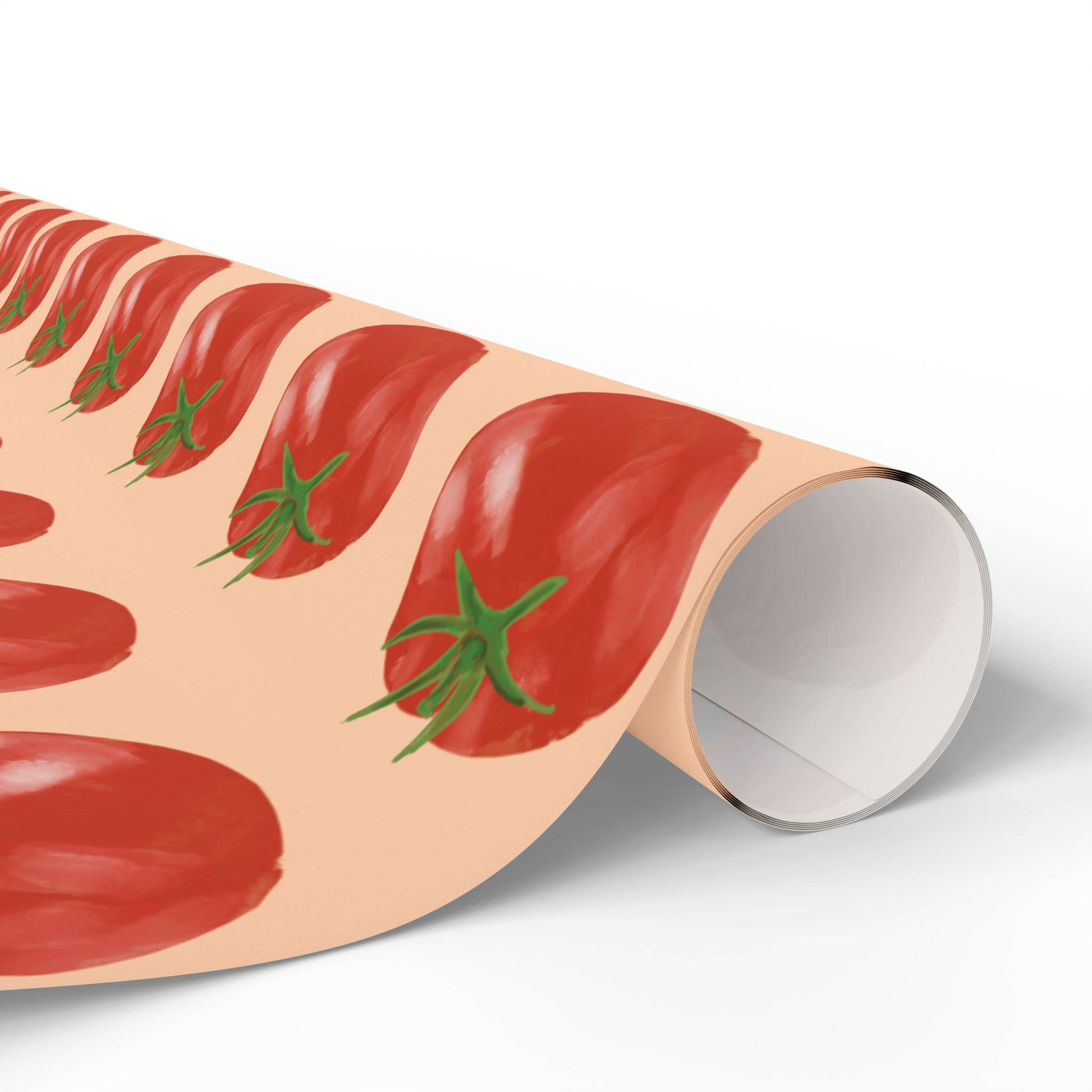 Roll of paper with red tomato design on a white background