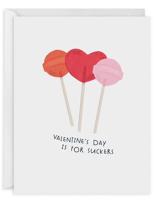 greeting card with valentines lollipops on it and text that reads "valentine's day is for suckers"