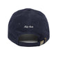 Navy blue cap with 'Kirty Studio' embroidery on a white background