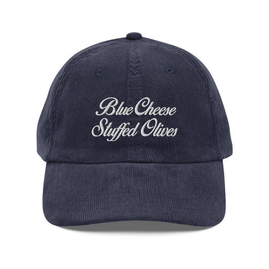 Navy blue cap with 'Blue Cheese Stuffed Olives' text on a white background