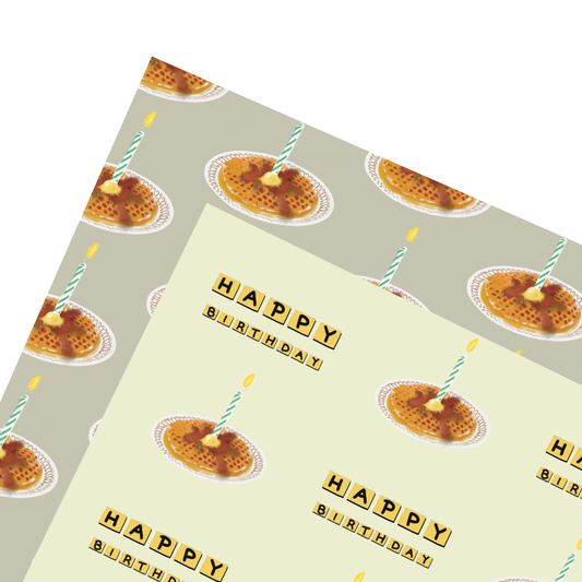 Sheet of wrapping paper with waffle illustrations and 'Happy Birthday' text in Waffle House stylization on a white background.