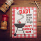 Father's Day card with BBQ graphic and text on a wooden surface with matchsticks and salt and pepper shakers.