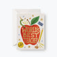 Greeting card with an apple design and 'World's Best Teacher' text on a white background