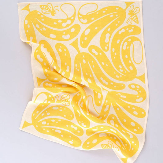 yellow "go bananas" kitchen towel -- design has ripe, spotted bananas and bees