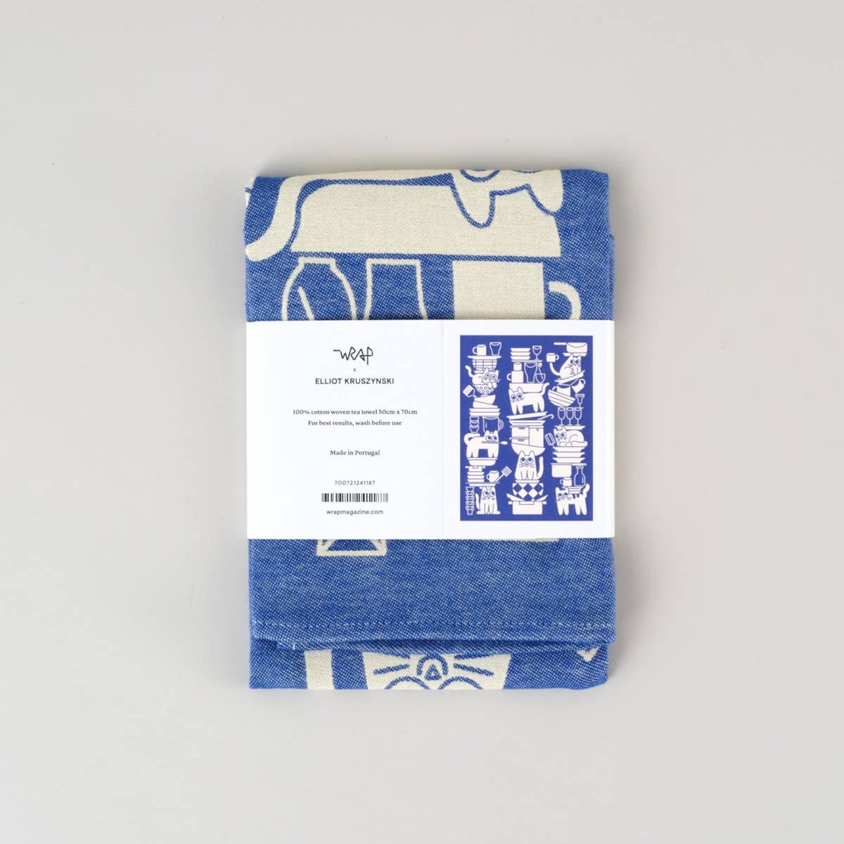 image of the back of the paper band packaging for the "kitchen cats" tea towel 