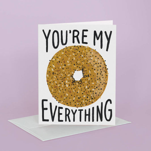 Card with an everything bagel illustration and text 'You're my everything' on a light purple background