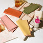 4 piece cloth napkin set in pink, terracotta, sage and yellow 