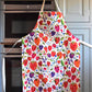 White apron designed with different berries