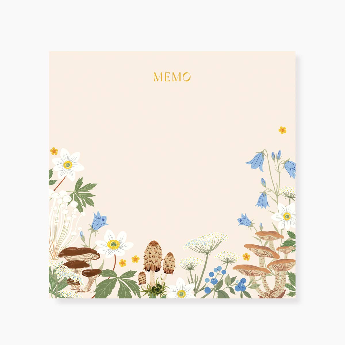 Blank memo pad with mushrooms and flowers bordering the bottom 