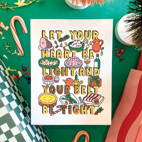 Holiday greeting card that reads "Let your heart be light and your belt be tight" with lots of holiday foods and drinks. 