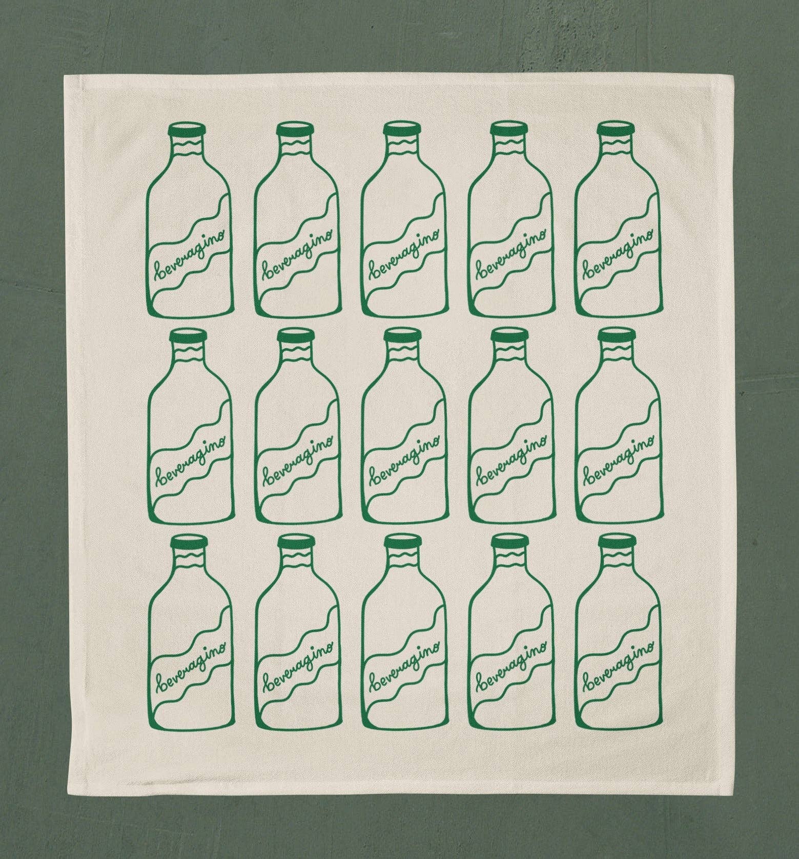 Natural colored tea towel with 3 rows of 5 bottles printed in green ink on it that read "beveragino"