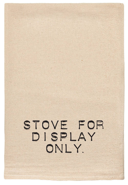 Natural colored tea towel that reads "stove for display only" 