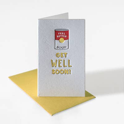 Mini enclosure, letterpressed card with a can of soup called "Feel Better Soup." The card reads "Get well soon!" under the can. Yellow envelope.