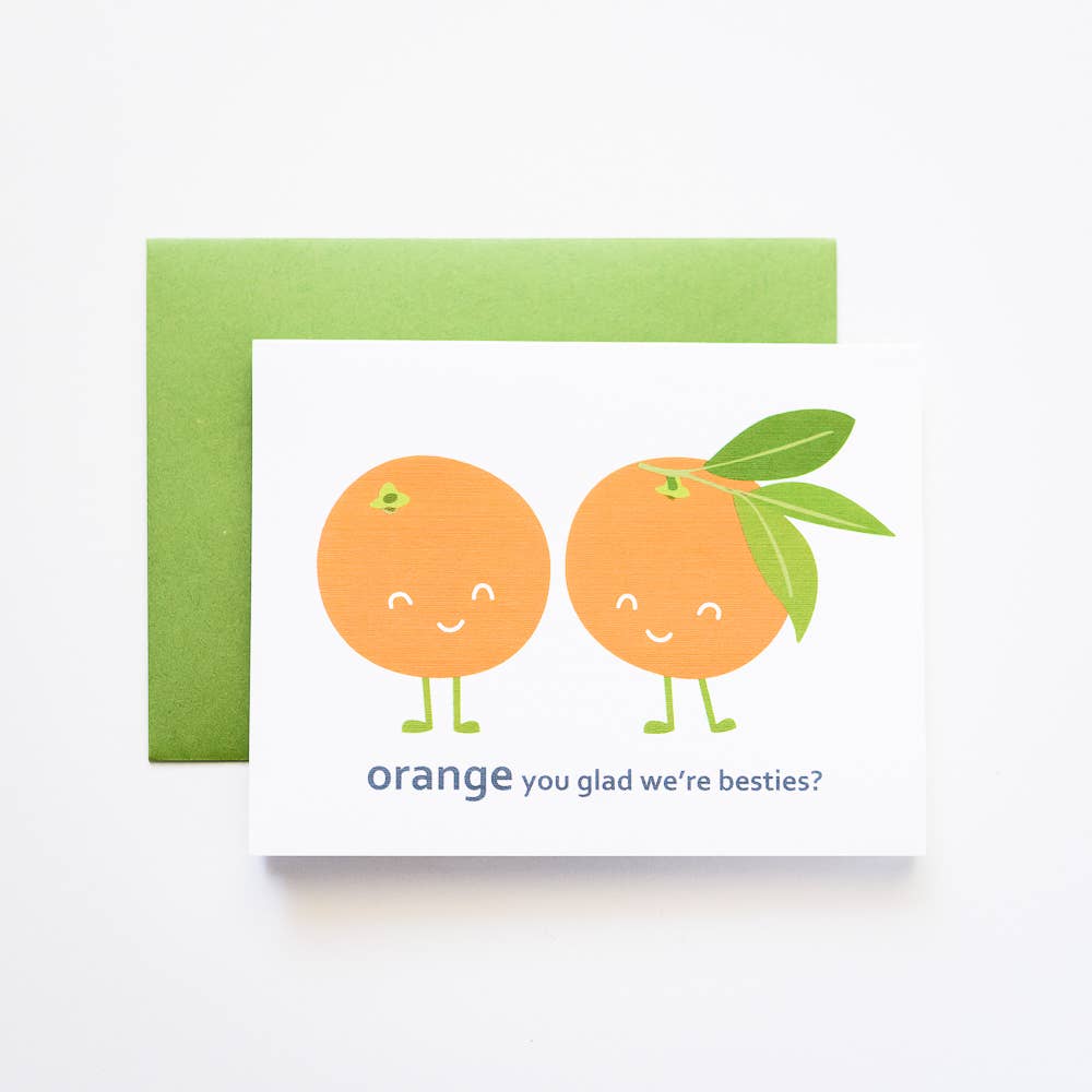 Oranges greeting card that reads "Orange you glad we're besties?" underneath images of two oranges 