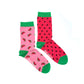 pair of women's mismatched watermelon socks -- light pink with watermelon slices and hot pink with black seeds 