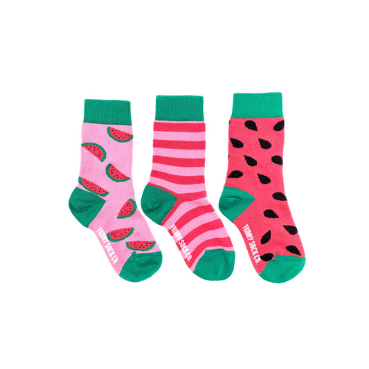 3 pair of mismatched watermelon kids socks -- pink with watermelon slices on it, pink stripes and pink with black seeds 
