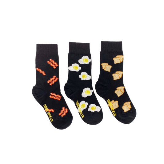3 pair of mismatched kid socks -- patterns include bacon, eggs and toast