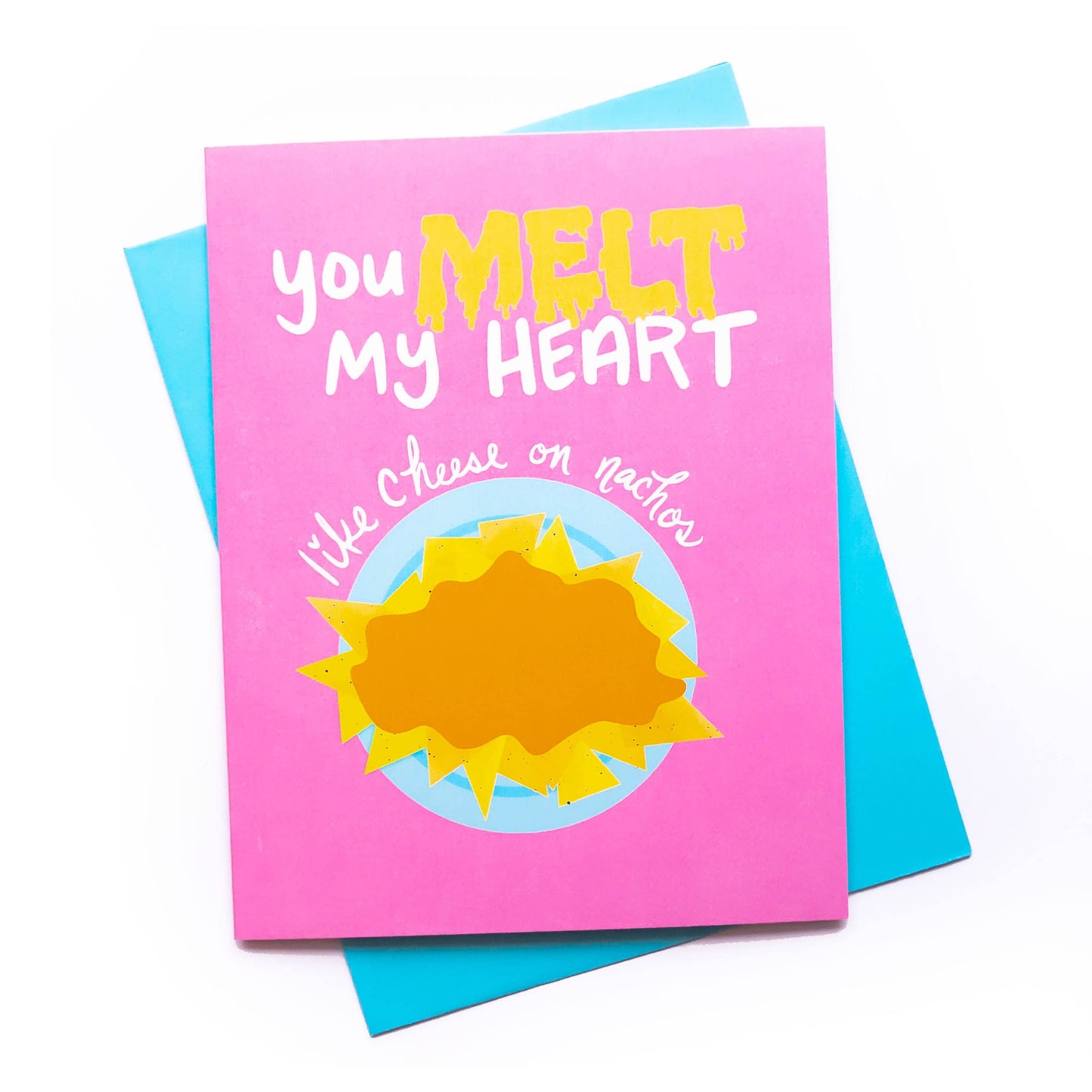 Pink greeting card that reads "You melt my heart like cheese on nachos"