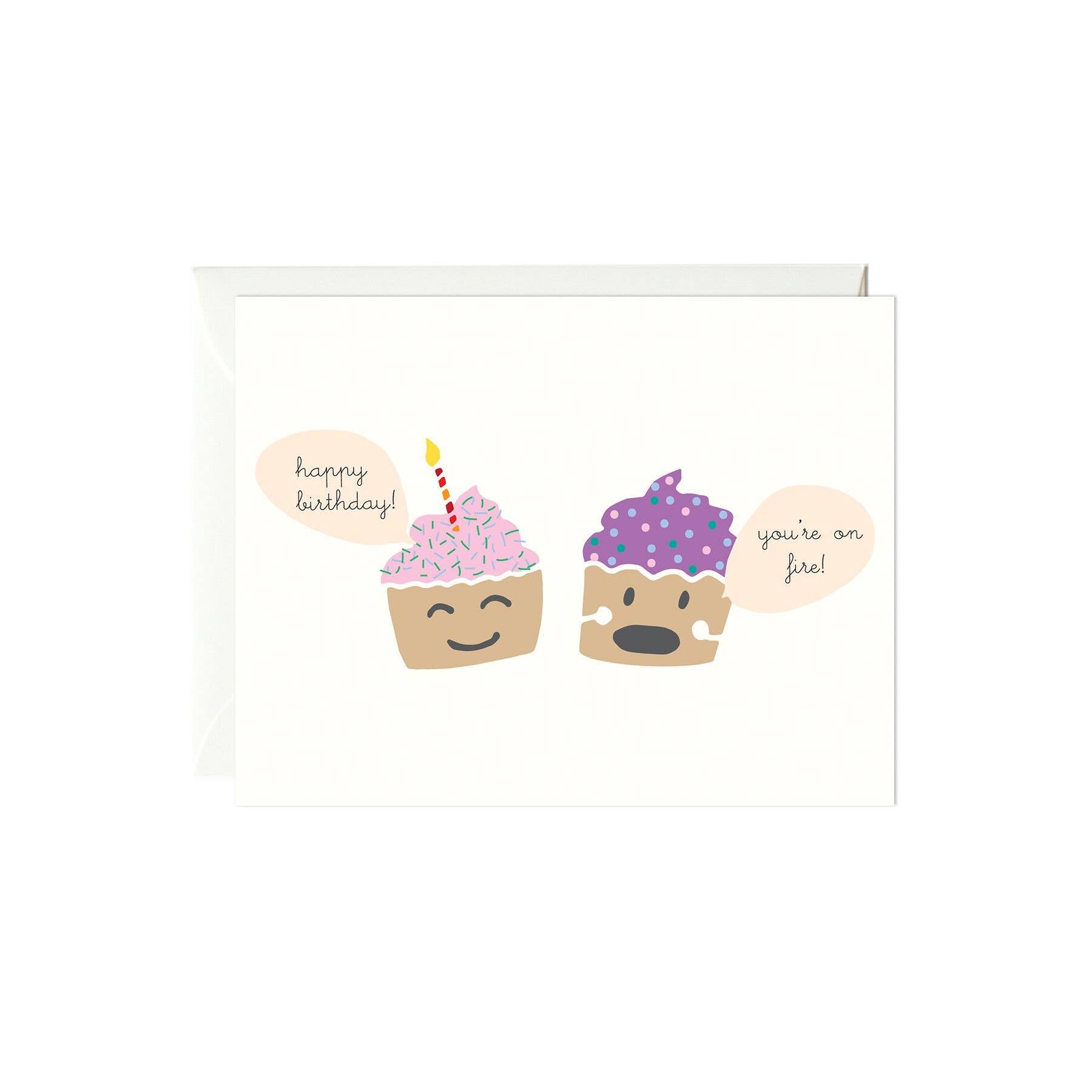 Birthday cupcakes greeting card -- one cupcake with a candle reads "happy birthday" and the other without reads "You're on fire!"