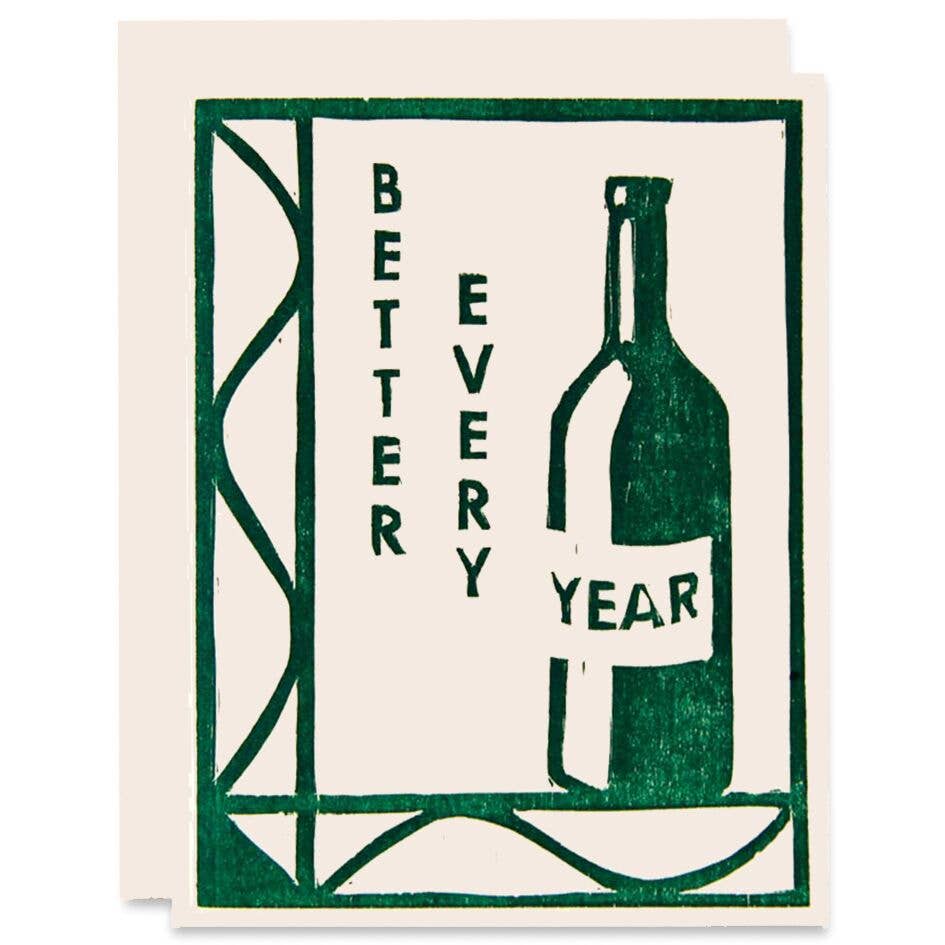 Greeting card that reads "Better Every Year" next to a wine bottle, all in dark green ink.